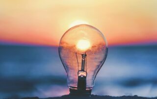 selective focus photography of light bulb